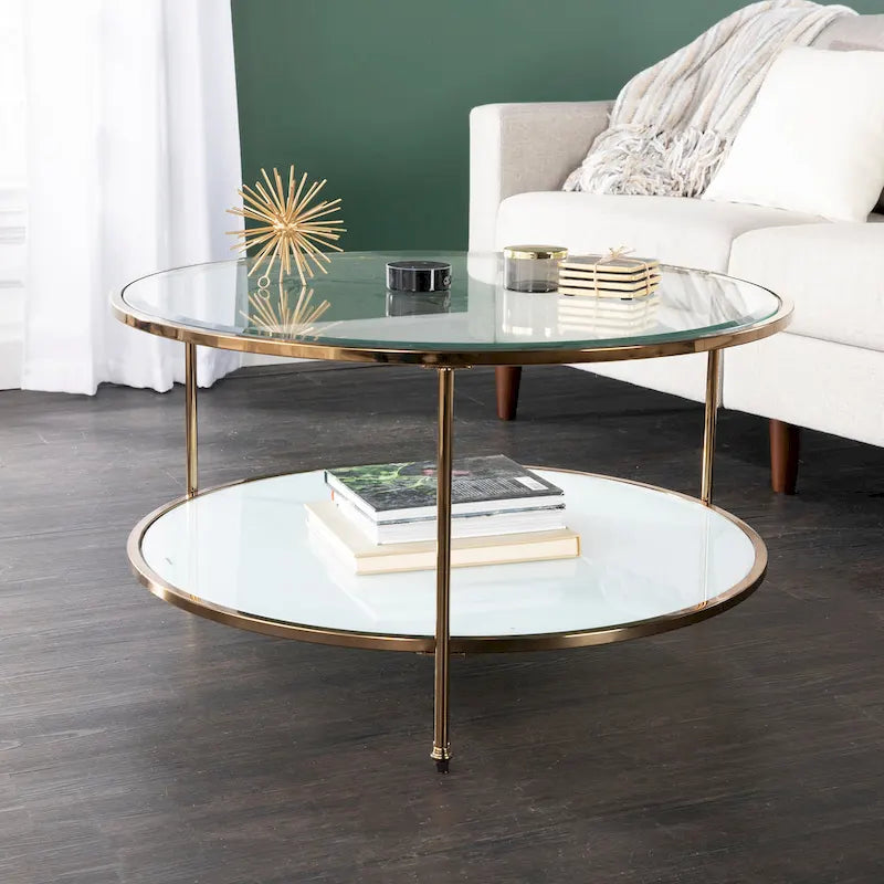 Table basse ronde or et cuivre avec rangement et plateau en verre, pieds tripodes