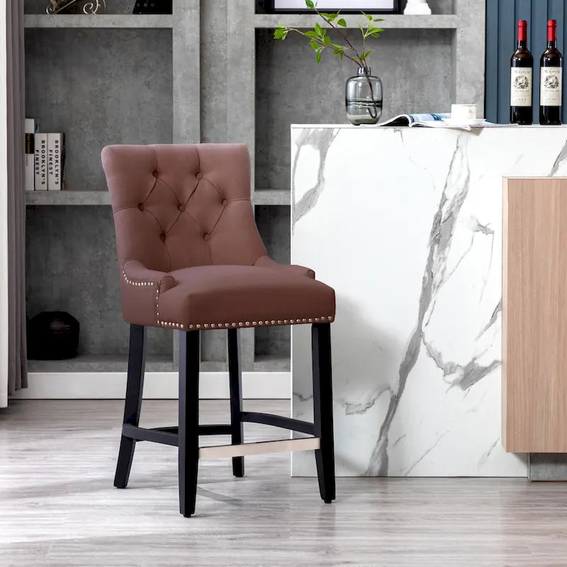 Tabouret de comptoir Carter 24 capitonné, pieds noirs